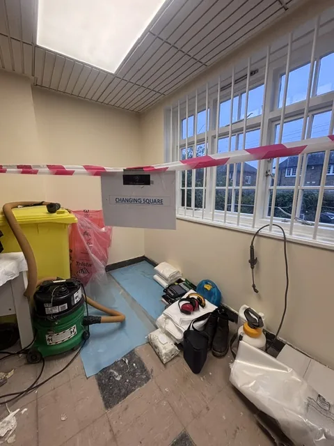 Asbestos floor tile and bitumen removal in Neasden